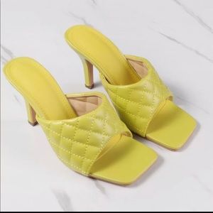 Yellow quilted slide in sandal heels